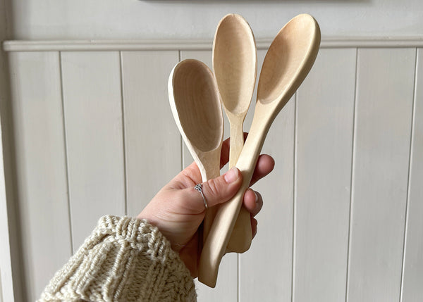Carved Spoons in Hanging Rack