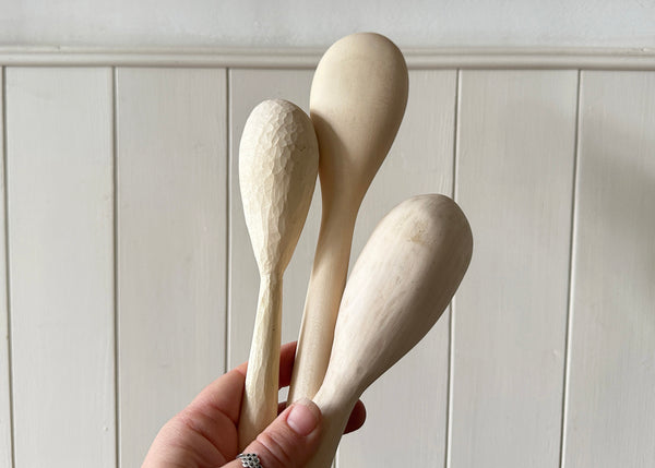 Carved Spoons in Hanging Rack